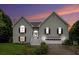 Charming two-story home featuring traditional architecture, manicured lawn, and inviting front entrance with stairway at 270 Meadow View Dr, Grayson, GA 30017