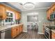 Cozy kitchen featuring stainless steel appliances, granite countertops, and tile backsplash at 270 Meadow View Dr, Grayson, GA 30017