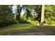 Picturesque backyard with mature trees offers a private and serene outdoor space at 2390 Tiffany Pl, Decatur, GA 30035