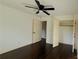 Bedroom with hardwood floors, closet, and a ceiling fan at 2390 Tiffany Pl, Decatur, GA 30035