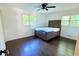 Bright bedroom with hardwood floors and large windows that offer ample natural light at 2390 Tiffany Pl, Decatur, GA 30035