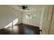 The bedroom features hardwood floors, a window, and ample natural light at 2390 Tiffany Pl, Decatur, GA 30035