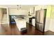 Modern kitchen featuring a center island, stainless steel appliances, and white cabinets at 2390 Tiffany Pl, Decatur, GA 30035