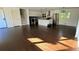 Open-concept living space showcasing hardwood floors and stairs leading to the upper level at 2390 Tiffany Pl, Decatur, GA 30035