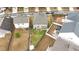 Birds eye view of the backyard and surrounding neighborhood, with mature trees and privacy fencing at 366 Highbranch Cir, Lawrenceville, GA 30044