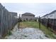 Large backyard featuring mature trees and ample space for outdoor activities and entertaining at 366 Highbranch Cir, Lawrenceville, GA 30044