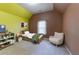 This bedroom features an accent wall, plush carpet, and a cheerful window with bright light at 366 Highbranch Cir, Lawrenceville, GA 30044