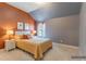 Cozy bedroom features a neutral color scheme, soft textures, and natural light from the window at 366 Highbranch Cir, Lawrenceville, GA 30044