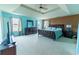 Spacious main bedroom offers natural light and a neutral color scheme at 366 Highbranch Cir, Lawrenceville, GA 30044