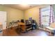 Functional office space with a desk, chairs, and natural light, perfect for working from home at 366 Highbranch Cir, Lawrenceville, GA 30044