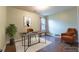 Comfortable office with hardwood floors, desk, chair, and a calming plant, providing a serene workspace at 366 Highbranch Cir, Lawrenceville, GA 30044