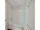 A clean bathroom with white tiled shower and soaking tub combination at 10814 Wheeler Trce, Hampton, GA 30228