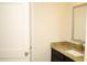 Bathroom vanity with granite countertop and modern fixtures at 1612 Fuma Leaf Way, Mcdonough, GA 30253