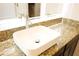 Stylish bathroom with a sleek, white vessel sink and granite countertop at 1612 Fuma Leaf Way, Mcdonough, GA 30253