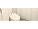 Elegant toilet in a well-lit bathroom at 1612 Fuma Leaf Way, Mcdonough, GA 30253