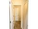 Bathroom doorway, featuring modern door hardware, and tan shower curtain at 1612 Fuma Leaf Way, Mcdonough, GA 30253