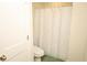 Bright bathroom with a shower featuring a stylish curtain at 1612 Fuma Leaf Way, Mcdonough, GA 30253