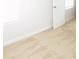 Bedroom featuring plush neutral carpet and clean white baseboards at 1612 Fuma Leaf Way, Mcdonough, GA 30253