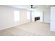 Spacious bedroom features ceiling fan, and doorway to a kitchen at 1612 Fuma Leaf Way, Mcdonough, GA 30253