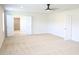 Spacious bedroom with ceiling fan, and doorway to a closet at 1612 Fuma Leaf Way, Mcdonough, GA 30253
