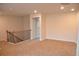Second floor hallway featuring neutral carpeting and recessed lighting at 1612 Fuma Leaf Way, Mcdonough, GA 30253