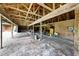Image shows interior of barn with a lot of storage and workspace at 891 Wooten Ct, Canton, GA 30114