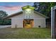 Well-lit horse barn featuring multiple stalls and a practical design at 891 Wooten Ct, Canton, GA 30114