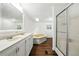 Bathroom featuring double sinks, bathtub, shower, and ample space for comfort at 891 Wooten Ct, Canton, GA 30114