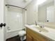 Neutral bathroom featuring a tub/shower combination and light vanity at 891 Wooten Ct, Canton, GA 30114