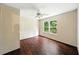 Spacious bedroom with wood-look floors and a ceiling fan at 891 Wooten Ct, Canton, GA 30114