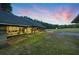 Open-sided outbuilding with views of the adjacent field at 891 Wooten Ct, Canton, GA 30114