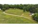 Panoramic view of extensive green property with mature trees at 891 Wooten Ct, Canton, GA 30114