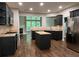 Modern kitchen features stainless steel appliances, an island and ample countertop space at 944 Reap Ln, Lawrenceville, GA 30043