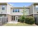Enjoy a backyard with a patio, privacy fence, and a grassy area for outdoor activities at 11686 Davenport Ln, Alpharetta, GA 30005