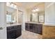 This bathroom offers granite countertops, double sinks, and a tile backsplash, exuding luxury at 11686 Davenport Ln, Alpharetta, GA 30005