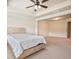 Neutral main bedroom with tray ceiling, carpet, and closet at 11686 Davenport Ln, Alpharetta, GA 30005