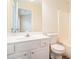 Bathroom featuring white cabinetry and a tub/shower combo at 3068 Lauren Parc Rd, Decatur, GA 30032