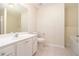Bathroom features white cabinets and a bathtub with a shower head at 3068 Lauren Parc Rd, Decatur, GA 30032