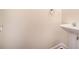 Half bathroom featuring pedestal sink, modern fixtures, and neutral decor at 3068 Lauren Parc Rd, Decatur, GA 30032
