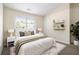 Cozy bedroom with modern decor, a comfortable bed, and plenty of storage space at 3068 Lauren Parc Rd, Decatur, GA 30032