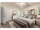 Serene bedroom with a vaulted ceiling, neutral colors, and ample natural light at 3068 Lauren Parc Rd, Decatur, GA 30032