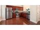 Modern kitchen with stainless steel appliances, dark wood cabinets, and lots of counter space at 3068 Lauren Parc Rd, Decatur, GA 30032