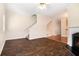 Open living room featuring hardwood floors, fireplace, and neutral paint at 3068 Lauren Parc Rd, Decatur, GA 30032