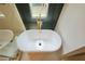 Modern bathroom features a luxurious soaking tub with gold fixtures and natural light at 455 Saddle Bow Dr, Lawrenceville, GA 30046