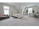 Large bedroom featuring an abundance of carpet and natural light at 455 Saddle Bow Dr, Lawrenceville, GA 30046