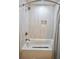 Neutral-toned bathroom featuring a shower-tub combo with modern tile and hardware at 455 Saddle Bow Dr, Lawrenceville, GA 30046