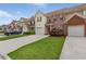 Charming multi-Gathering townhomes featuring garages, and manicured lawns adding to the community's curb appeal at 2924 Greyhawk Ln, Cumming, GA 30040