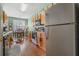 Bright kitchen with ample counter space, stainless steel appliances, and a view into the dining area at 2924 Greyhawk Ln, Cumming, GA 30040