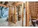 Basement area showing exposed wooden framing and packed moving boxes at 3866 Teresa Sw Ter, Lilburn, GA 30047