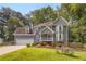 Charming two-story home with a well-maintained lawn and beautiful landscaping, complemented by a two-car garage at 3866 Teresa Sw Ter, Lilburn, GA 30047